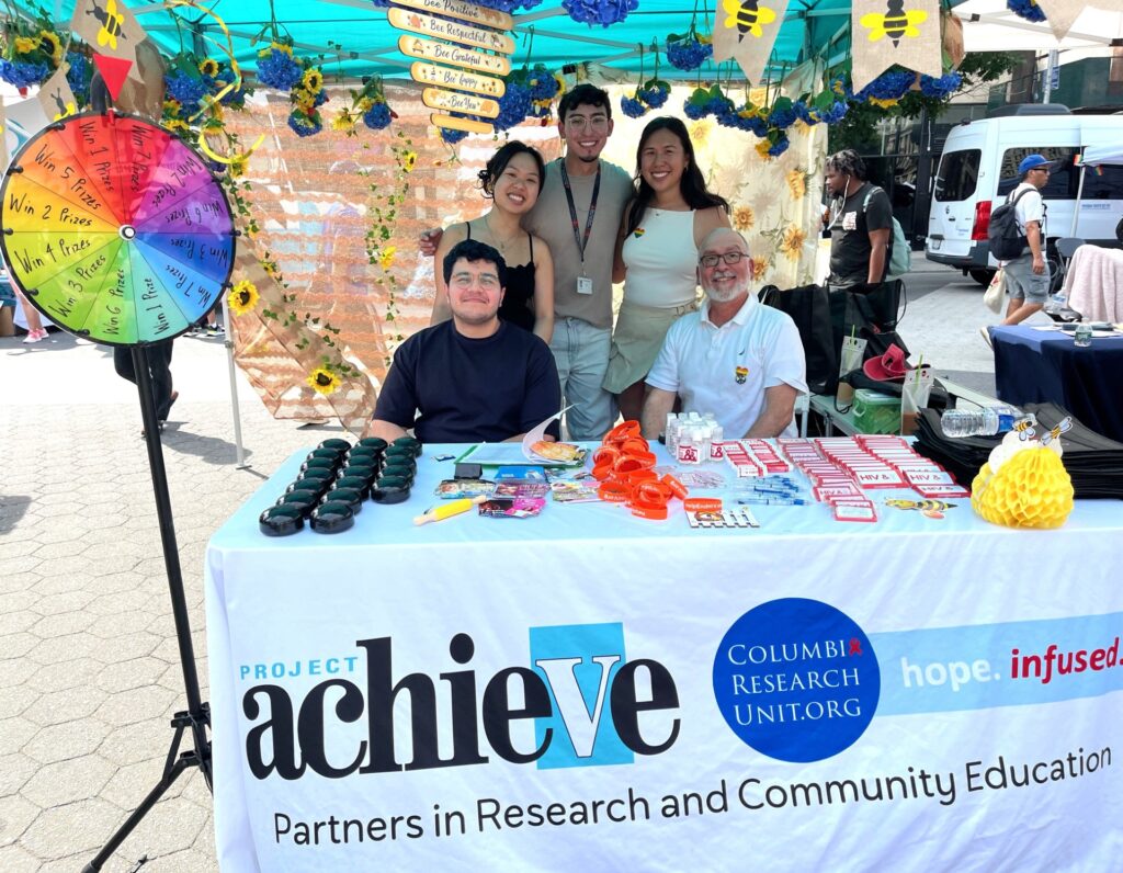 Project Achieve staff passing out flyers and materials at National HIV Testing Day.