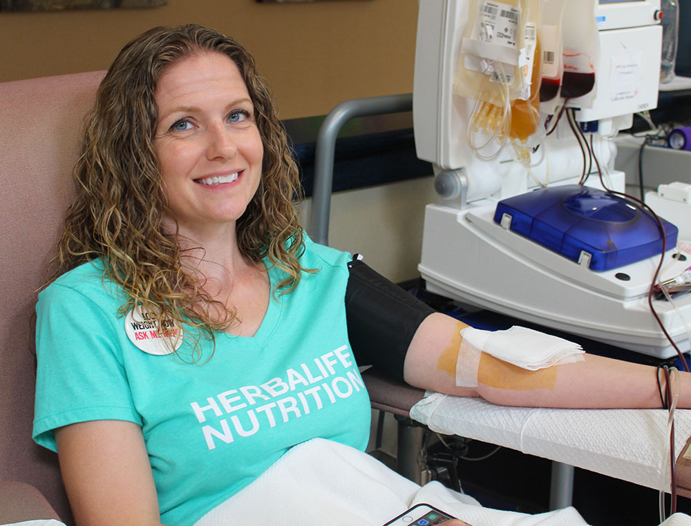 Amy Degnars donating blood.