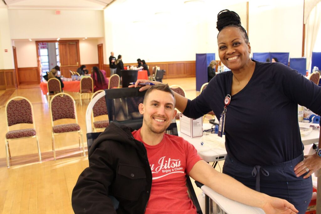 Student blood donor and BBD staff member.