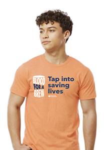 Man wearing a Tap into Saving Lives t-shirt.