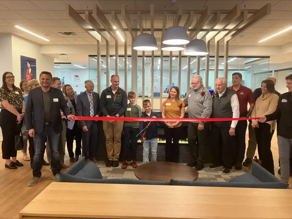 Bennett Young cutting the ribbon at Duluth grand opening